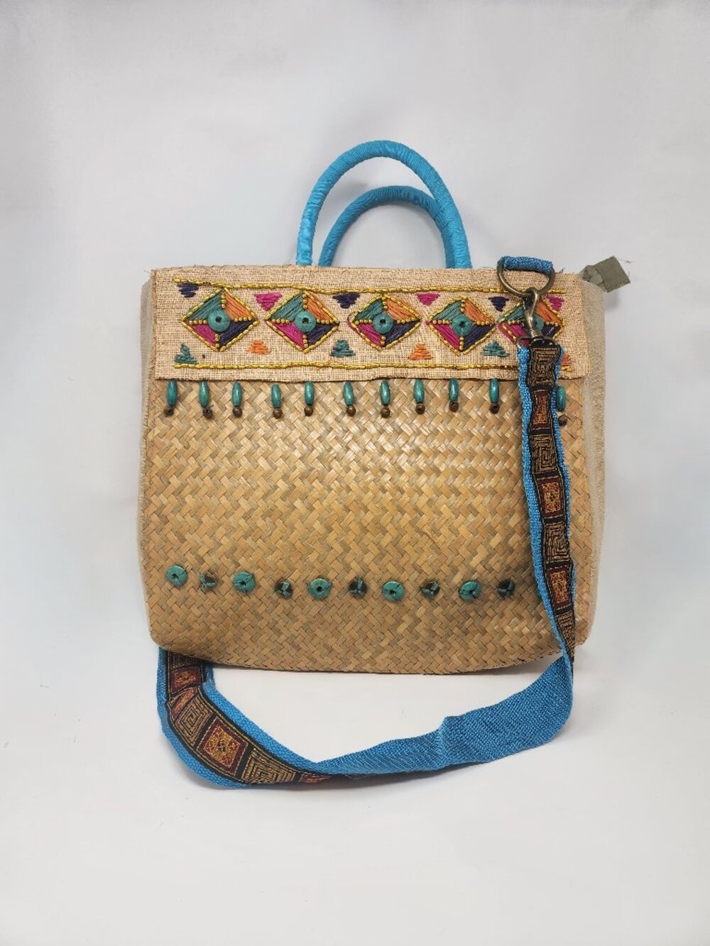 New straw bag with turquoise handle